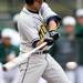 Michigan sophomore John DiLaura looks to connect with the ball against Eastern Michigan at Eastern on Wednesday.  Melanie Maxwell I AnnArbor.com